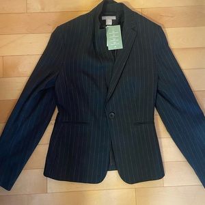 Never worn and new with tags. Simply doesn’t fit me anymore.